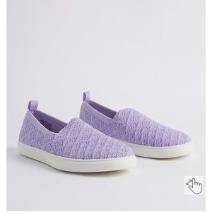 Torrid purple slip on shoes.